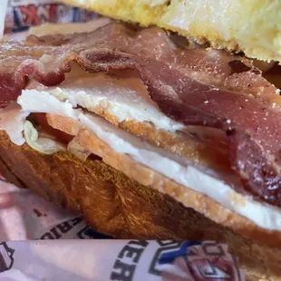 Turkey club with 3 slices of salty Turkey thick cut sour dough bread