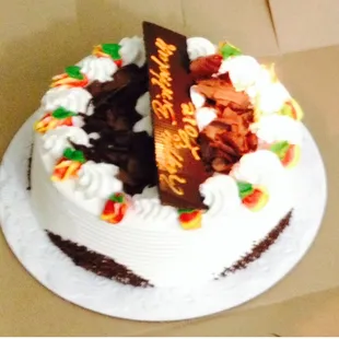 Rum Cake : 3 layer chocolate cake, 2 layer yellow cake, whipping cream and strawberry filling and one layer of custard cream