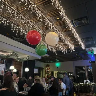 a large group of people sitting at tables