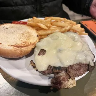 Mushroom and Swiss burger with fries