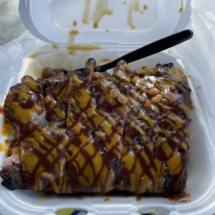 a fork in a styrofoam container