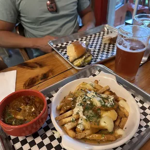 a plate of french fries and a bowl of soup