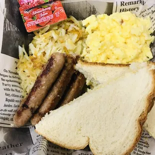 Scrambled eggs, sausage, hash browns and toast. Sunday breakfast in September. Take out only.