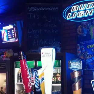 a bar with neon signs