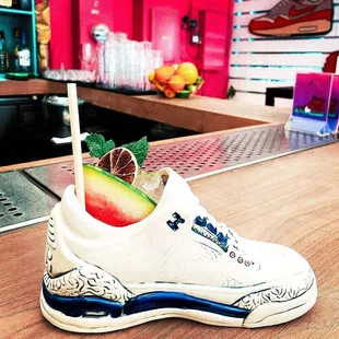 Grails &quot;Sneaker&quot; Cocktail (w/ 2 Drinks) - Take home our souvenir &quot;Grails&quot; Jordan-inspired sneaker vessel and get 2 free cocktails included.