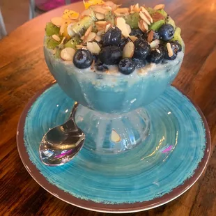 a bowl of fruit and nuts