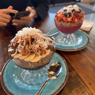 two bowls of food on a table