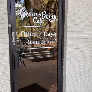 Hours on side entrance door