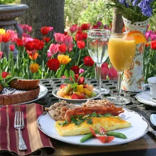 Accommodations include a hearty American-style breakfast served from a menu on the garden terrace, dining room or en suite.