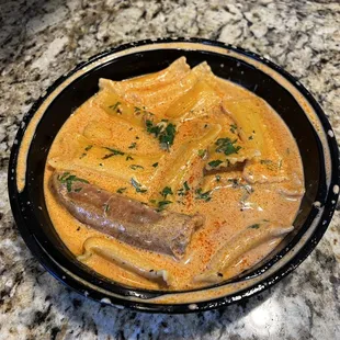 Stuffed rigatoni (almost is like a ravioli?) in pink sauce with sausage