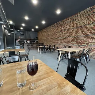 a glass of wine on a table