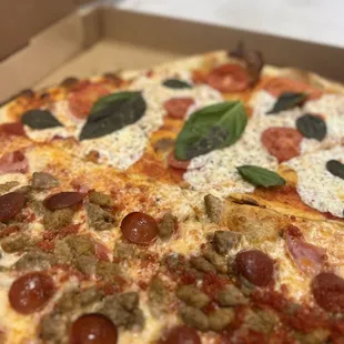 A Two-fer - 2 red sauce pies in one. Half and Half to please the whole family!