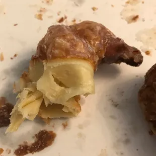 Half of a glazed. Way too doughy on the inside.