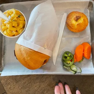 Pulled pork sandwich, cornbread macaroni, and cheese