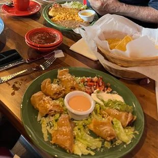 Chicken flautas, chimichanga with rice and beans. Excellent salsa!