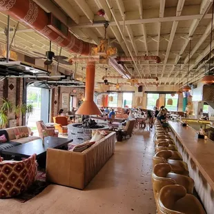 The main dining room.  Awesome atmosphere, love the fire place