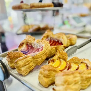 a variety of pastries on trays
