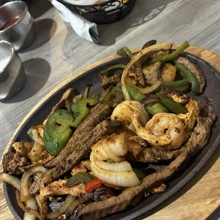 Texanan Fajitas!!! It had shrimp, steak, and chicken in it. Shrimp was cooked perfectly!!!