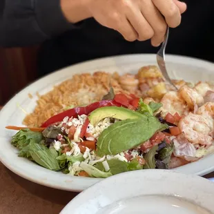 a plate of food with a fork in it