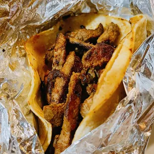 Carne Asada tacos (it comes with only meat) with a side of pico de gallo