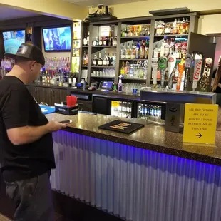 Still doesnt realize he needs to order at the food court bar...