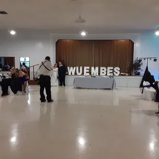 Transition after ceremony, removed chairs and arch added head table and made room for dance floor