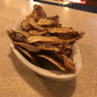 Complementary potato skin &quot;chips&quot; while we wait for our group to arrive!