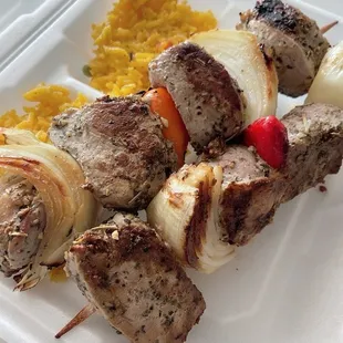 Pork Kebabs + side of rice. The kebabs are enough for 2 people. So tender and flavorful!
