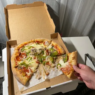 Soggy slice Can&apos;t even maintain its structural integrity when pulling away from the pie.