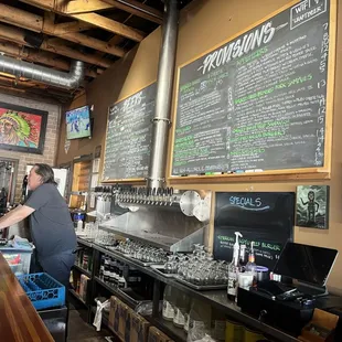 a man working behind the bar