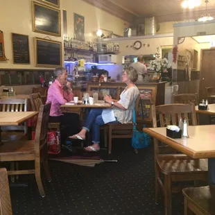 two people sitting at a table