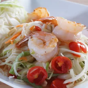 14. Tum Thai | Shredded Thai green papaya salad with grilled shrimp, tomatoes, green beans tossed in a lime- chili fish sauce dressing
