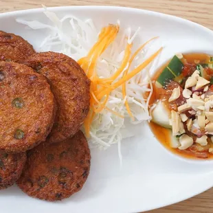 10. Fish Cake | Fried Thai Fish Cake with aromatics of chili, ginger, and garlic