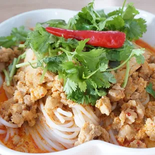 27. Kao Poon | 
Vermicelli noodles in red coconut curry soup served with chicken
  (can be made vegetarian)