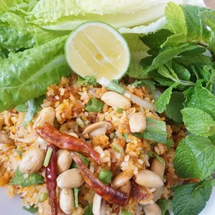 15. Kao Nam Tod 
| Fried rice ball mixed with preserved pork and peanuts paired with mixed veggies!