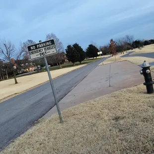 Grand Blvd Park:  No Parking Sign, Emergency Vehicles Only