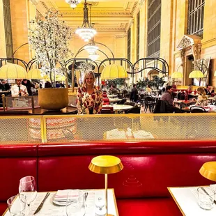 Table and tall ceilings with chandeliers