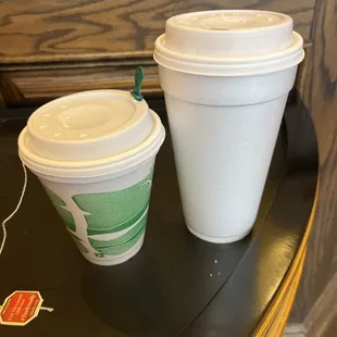 two cups of coffee on a table