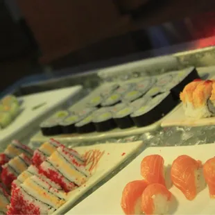 a variety of sushi and rolls