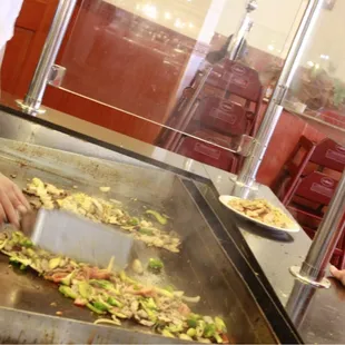 a person preparing food in a restaurant