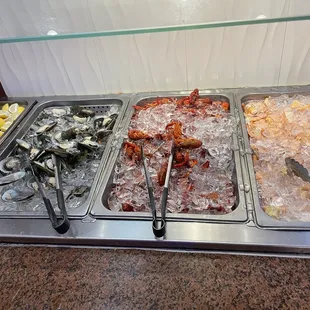 a variety of seafoods on ice