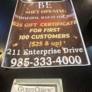 a sign for the opening of the grand buffet