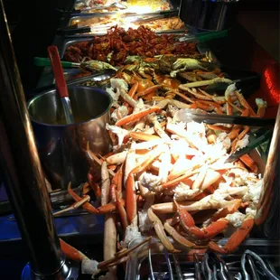 crab legs, carrots, and other food items