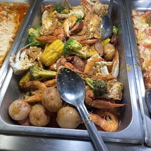a variety of food items in a buffet