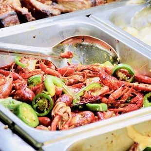 a variety of food items in a buffet