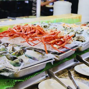 a variety of seafoods on ice