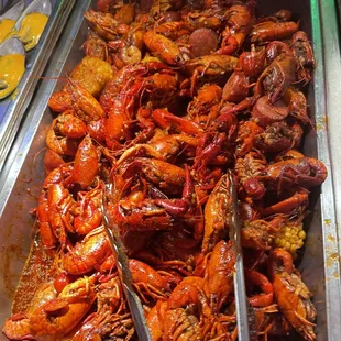 a tray of craws and other food items