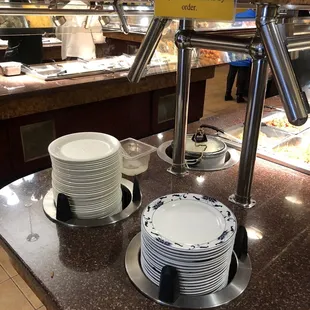 a variety of plates on a counter