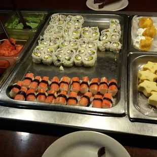a variety of sushi and rolls