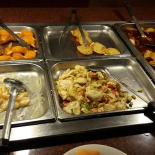 a variety of food items in trays